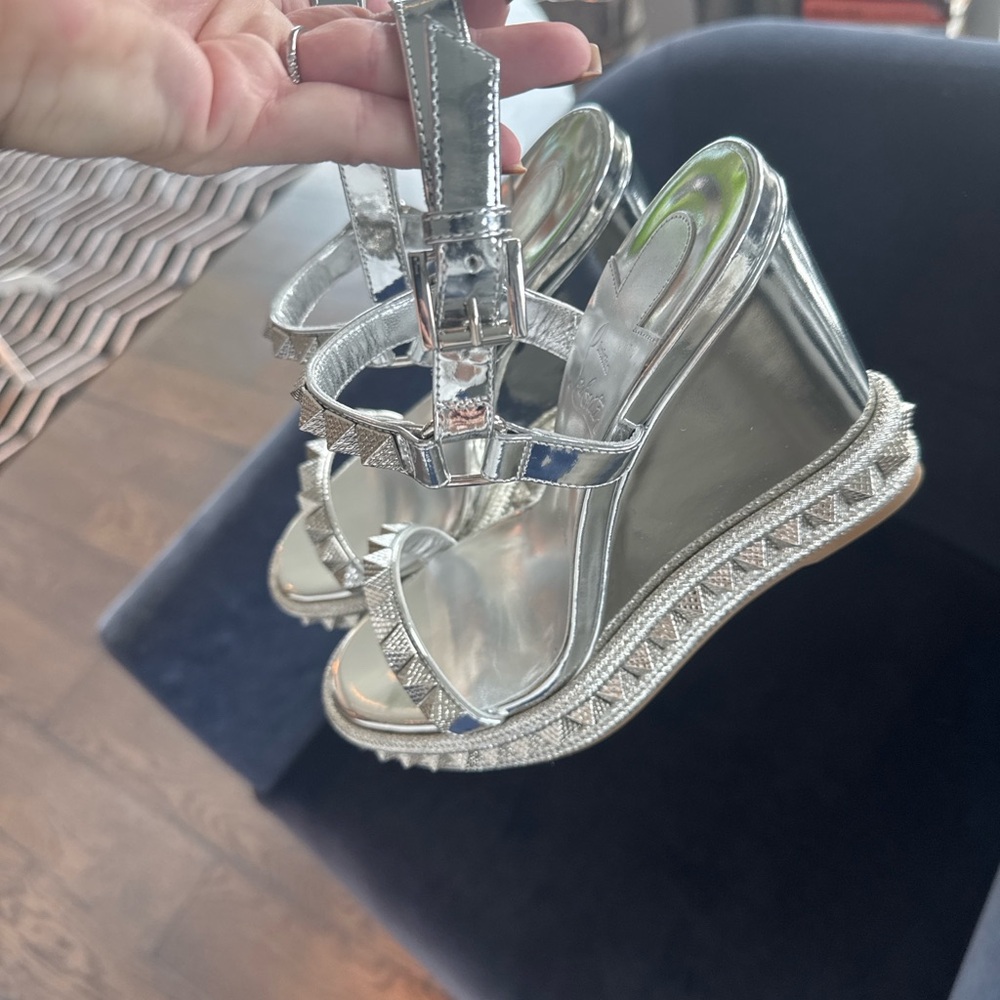 Brand new Christian Louboutin Metallic Silver Wedges